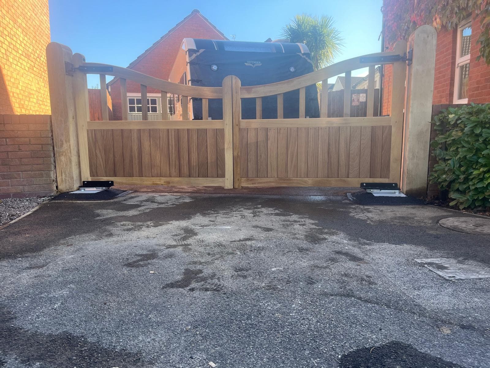 wooden underground swing gates — installation by Complete Gate Automation