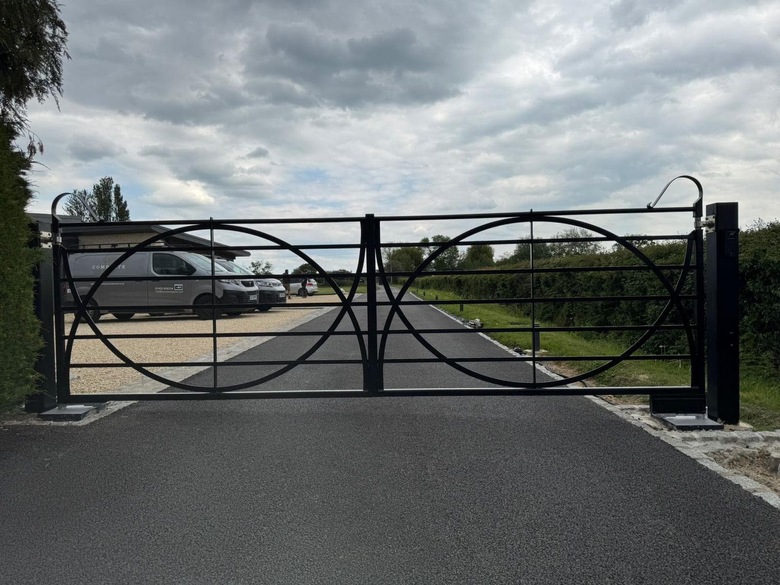 modern underground swing gate closed — installation by Complete Gate Automation