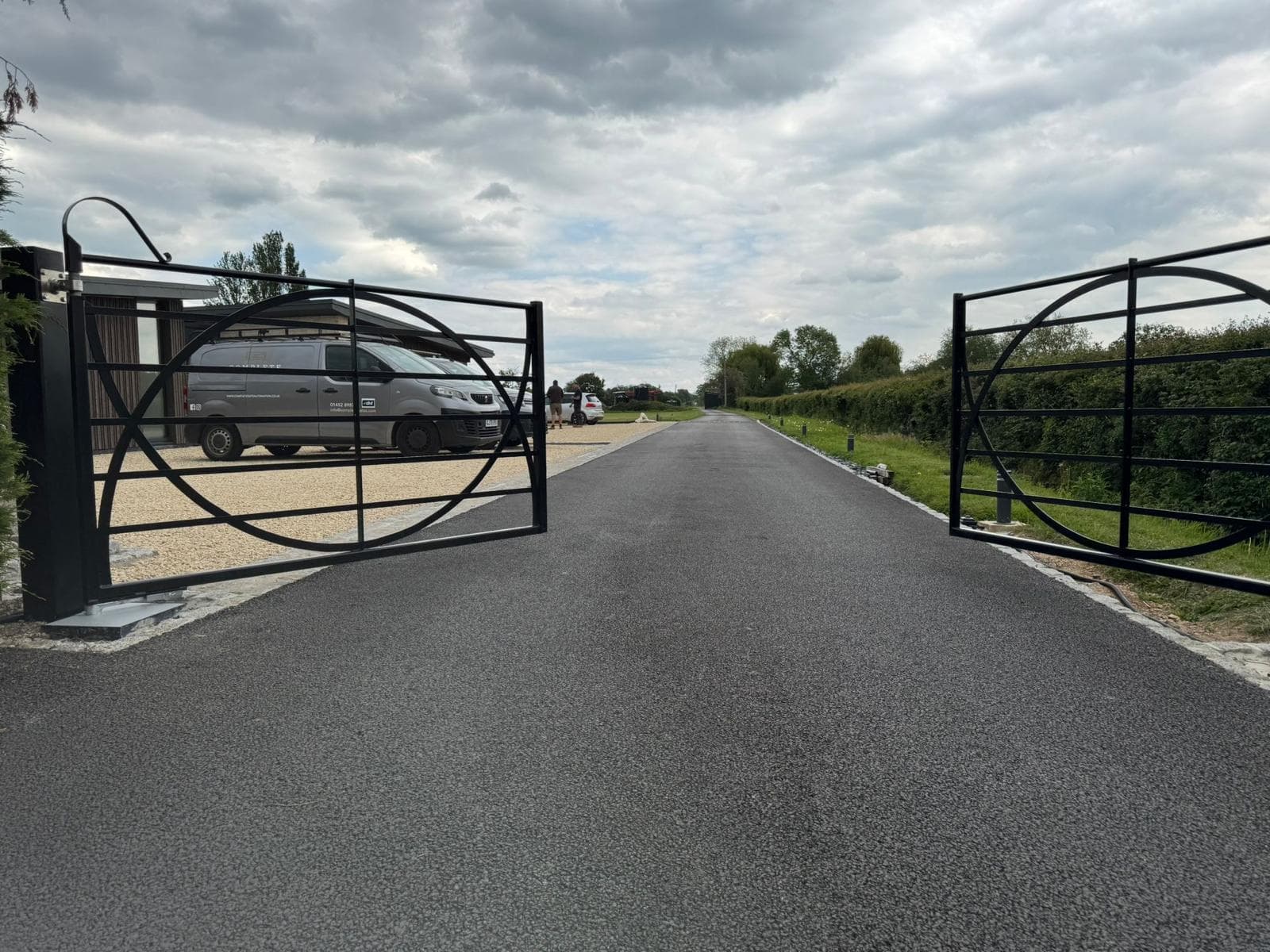 modern underground swing gate — installation by Complete Gate Automation